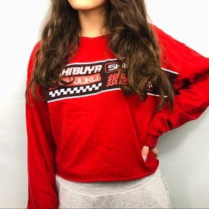 Red Long-Sleeved Graphic Top